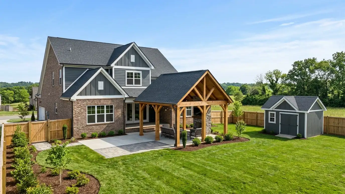 A Spring Hill, Tennessee home with a neat custom shed, a carport and a detached garage in a landscaped yard